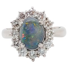 Estate Black Opal Oval and White Diamond Cocktail Ring in Platinum