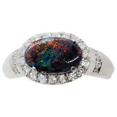 Estate Black Opal Oval and White Diamond Ring in Platinum