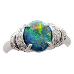 Estate Black Opal Oval and White Diamond Ring in Platinum