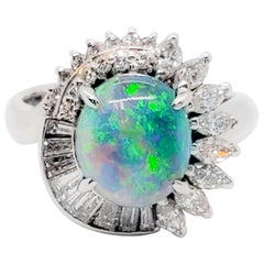 Estate Black Opal Oval Cabochon and White Diamond Cocktail Ring in Platinum