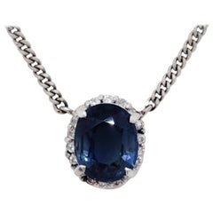 Estate Blue Sapphire and White Diamond Pendant Necklace in Platinum Estate Blue Sapphire and White Diamond Pendant Necklace in Platinum