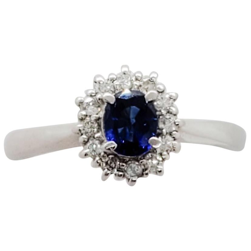 Estate Blue Sapphire Oval and Diamond Ring in Platinum