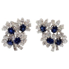 cluster white and blue sapphire earrings Estate Blue Sapphire Oval and White Diamond Cluster Earrings in Platinum