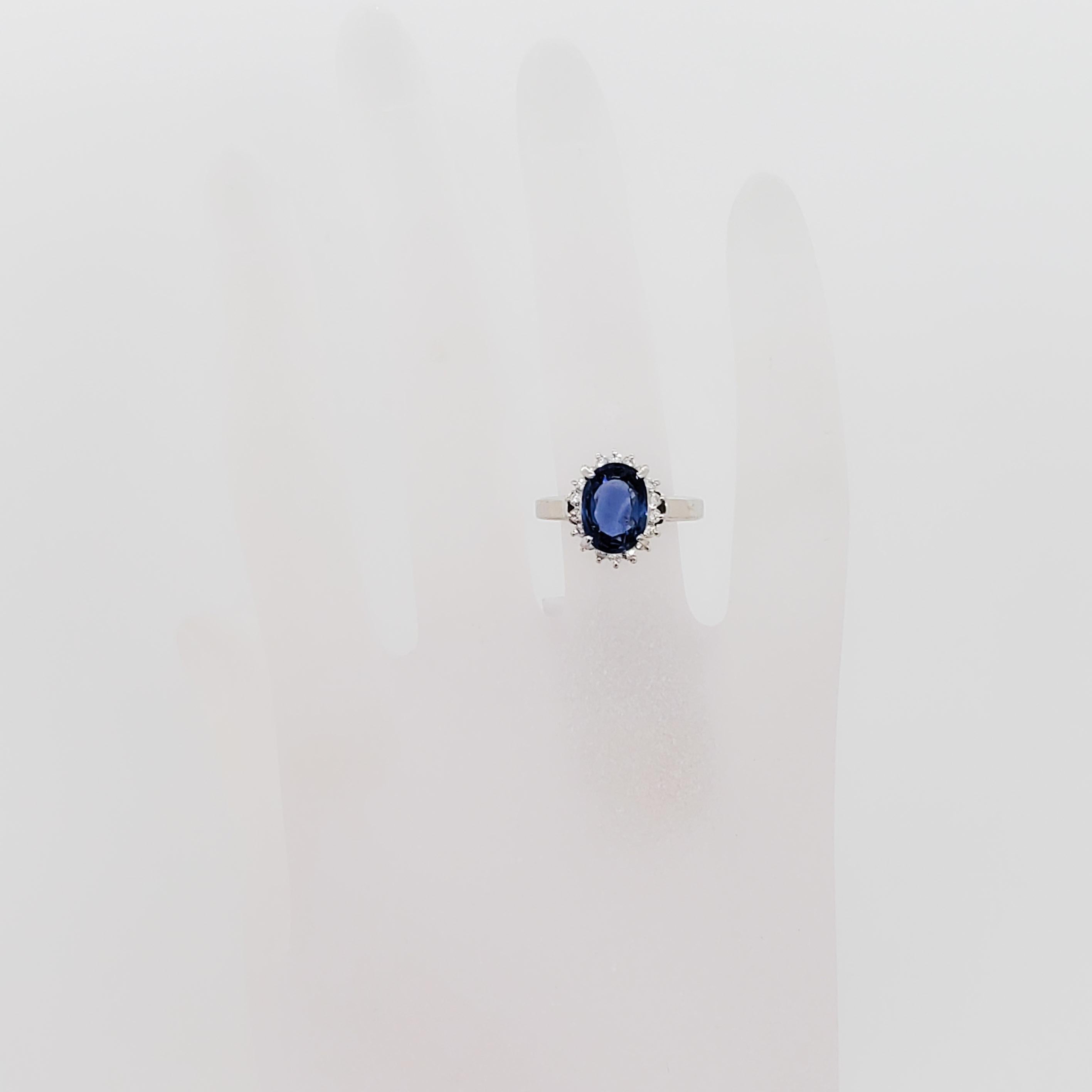 Beautiful deep blue color blue sapphire oval weighing 2.80 ct. with 0.26 ct. good quality white diamond rounds. Handmade mounting in platinum in ring size 6. Mint condition.