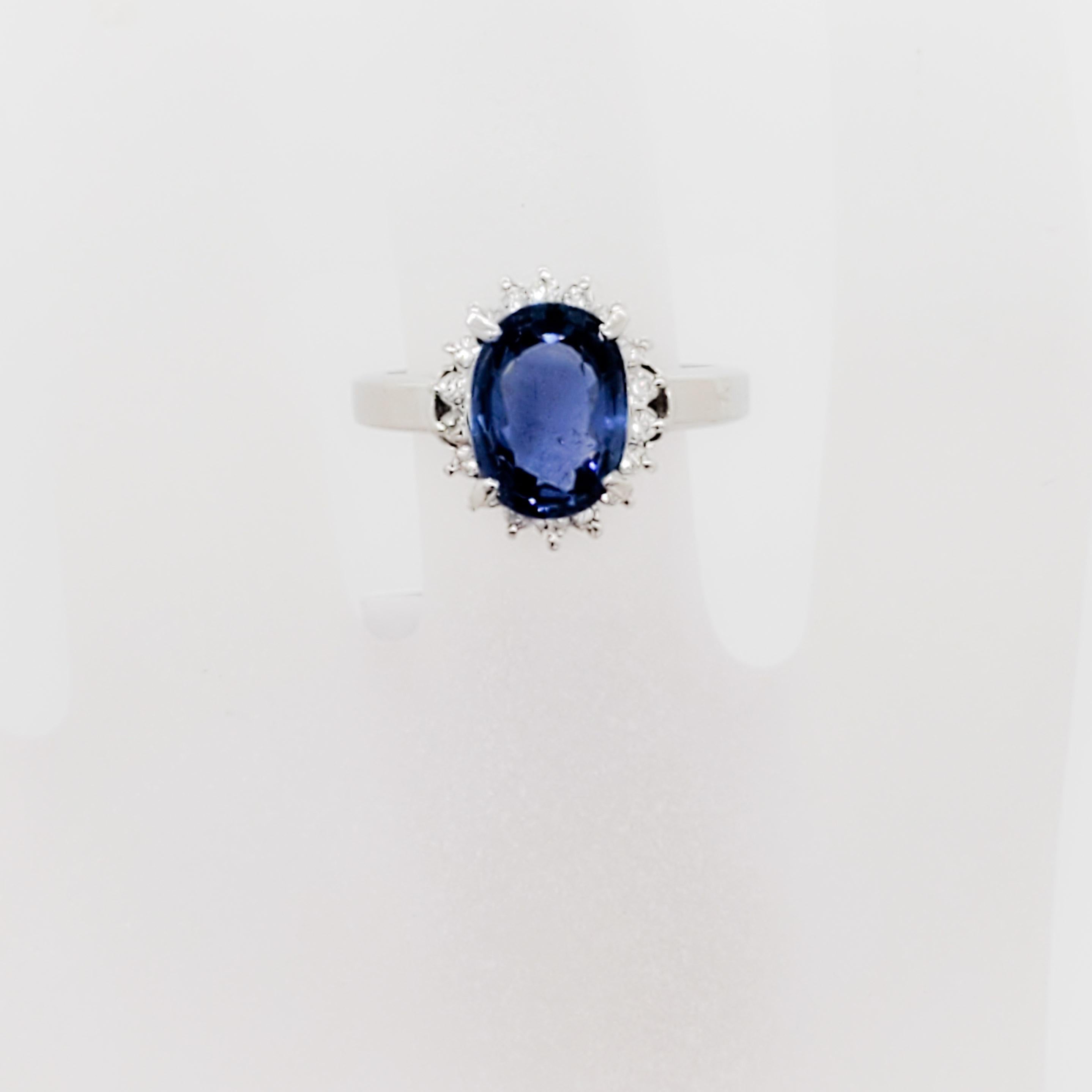 Oval Cut Estate Blue Sapphire Oval and White Diamond Cocktail Ring in Platinum