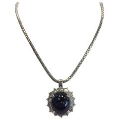 Retro  Blue Sapphire Oval Cabochon and Diamond Necklace in 18 Karat White Gold