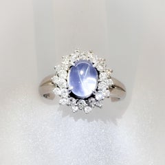 Estate Blue Star Sapphire Oval Cabochon and White Diamond Ring in Platinum