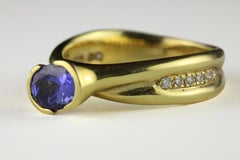 Estate Blue Tanzanite and Diamond Crossover Ring