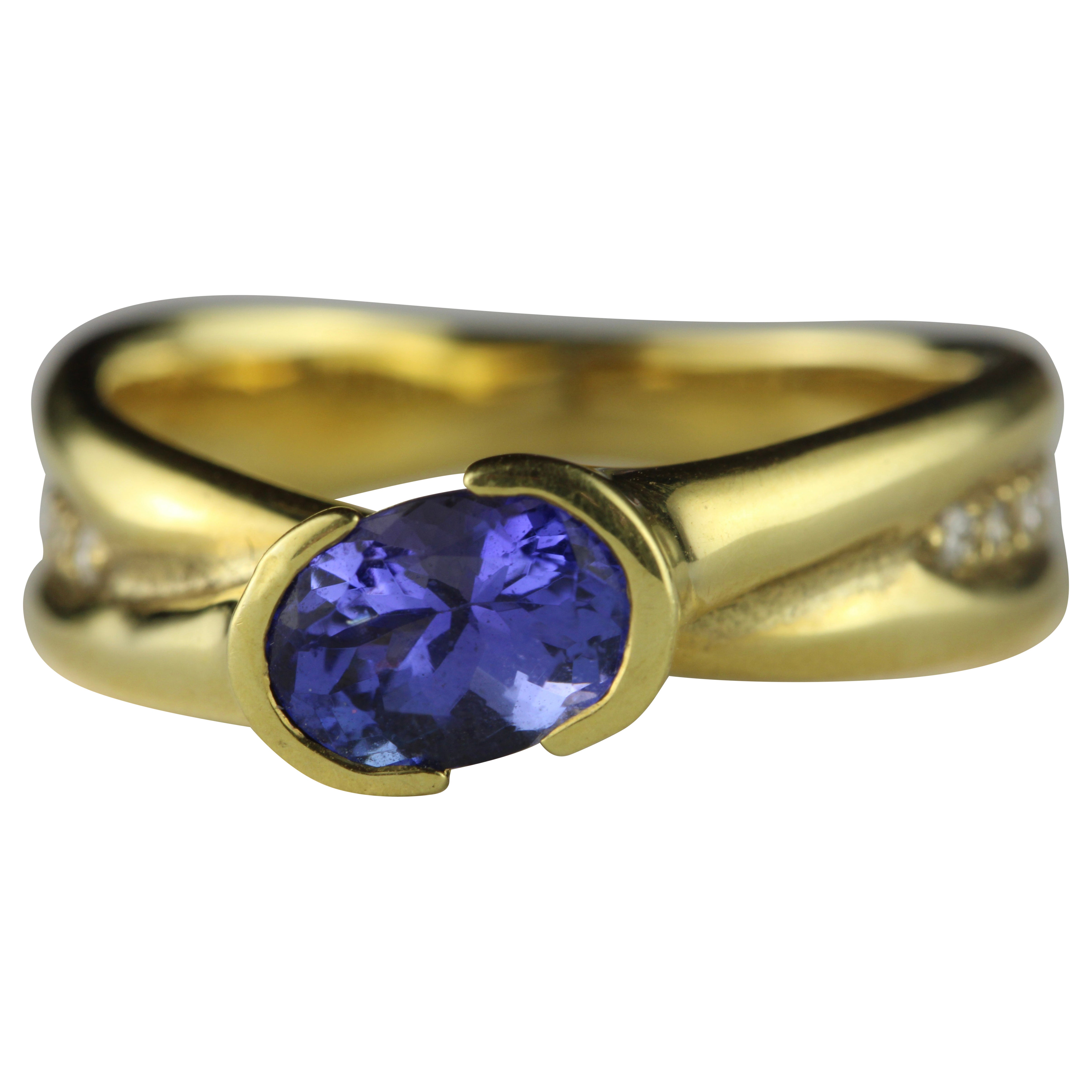 Estate Blue Tanzanite and Diamond Crossover Ring