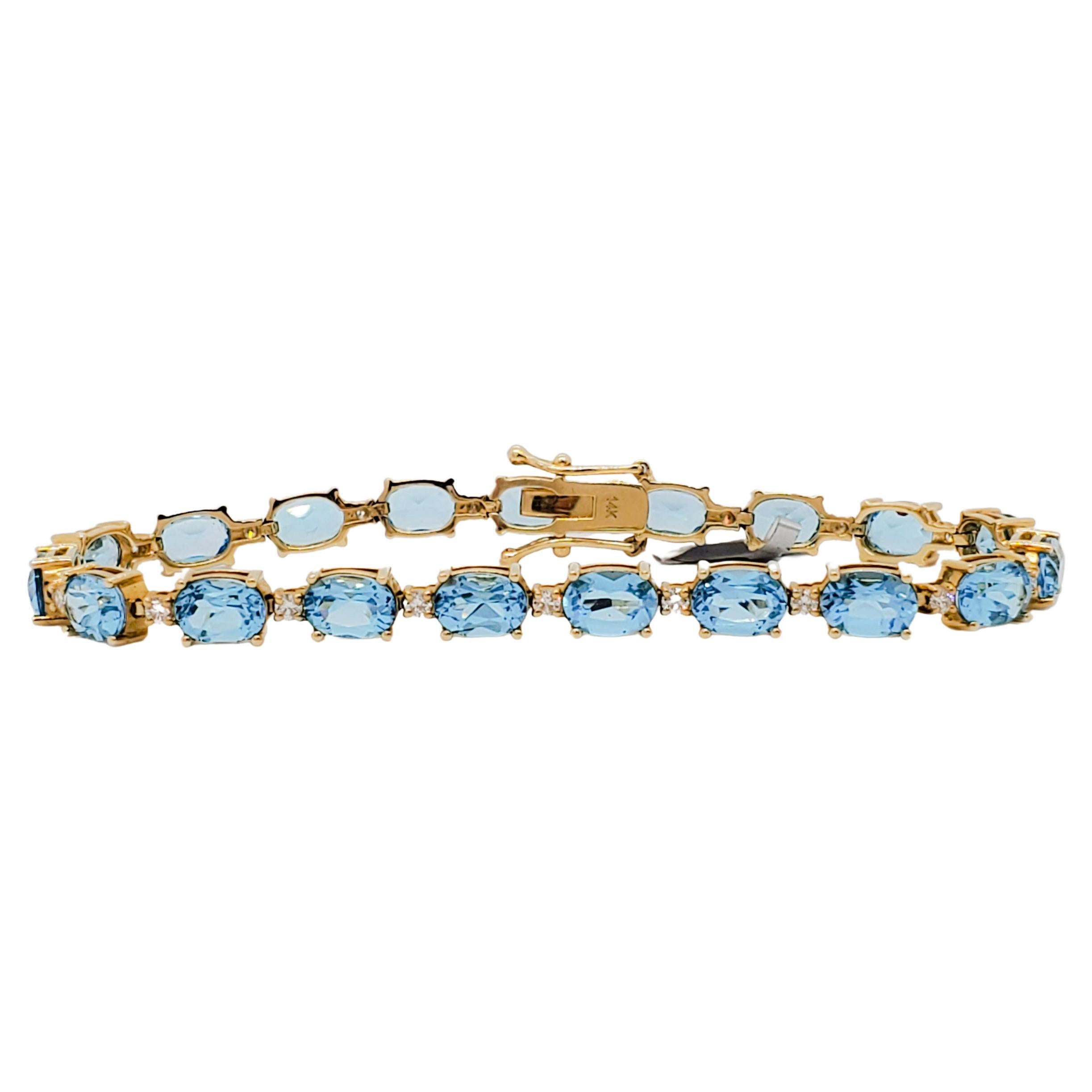 Blue Topaz and Diamond Straight Line Bracelet in 14k Yellow Gold