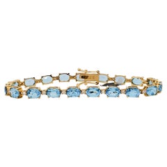 Bracelet ligne droite en or jaune 14k avec topaze bleue et diamant