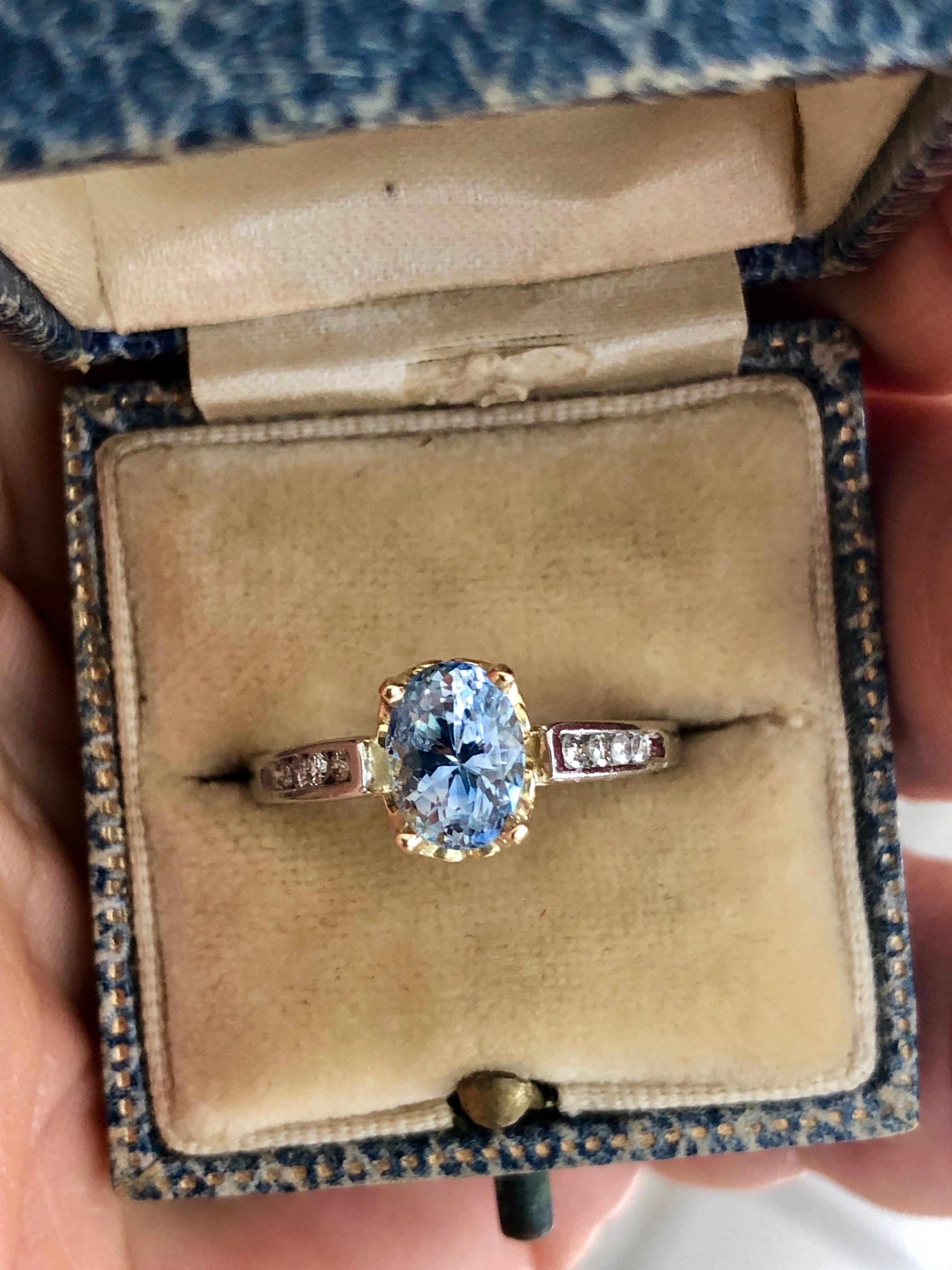 Shimmering Natural 1.75 carats natural medium Bluish-Lilac sapphire, VS clarity, 18K Yellow gold head & Platinum shank / Diamond accent approx. 0.25ct G-SI. This gorgeous engagement estate ring weight 4.2 Grams. Size: 6.5 and easy sizable. Comments: