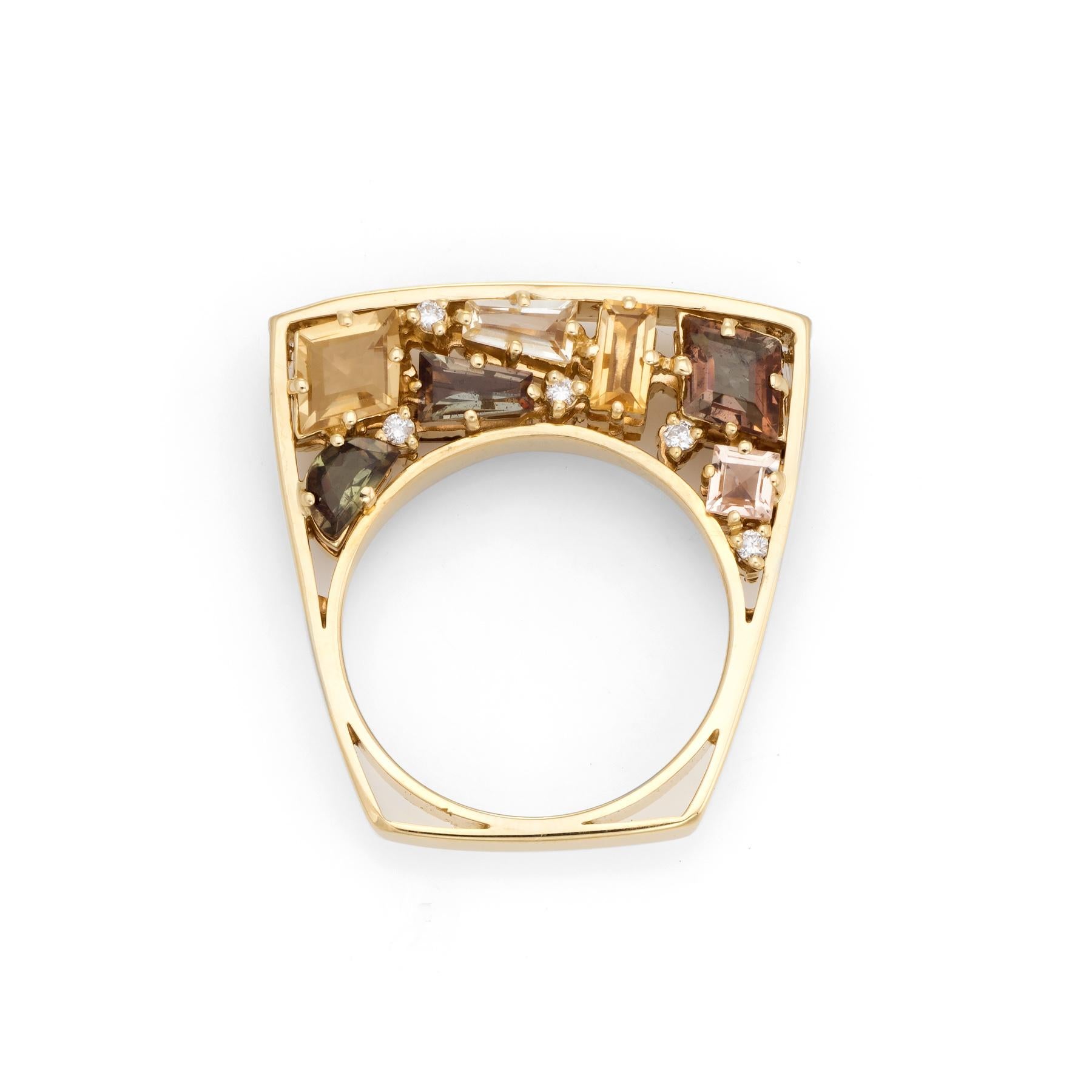 Finely detailed estate bridge ring, crafted in 18 karat yellow gold. 

Diamonds total an estimated 0.18 carats (estimated at H-I color and SI1-2 clarity), accented with citrine and smoky quartz totaling an estimated 6 carats. the stones are mixed
