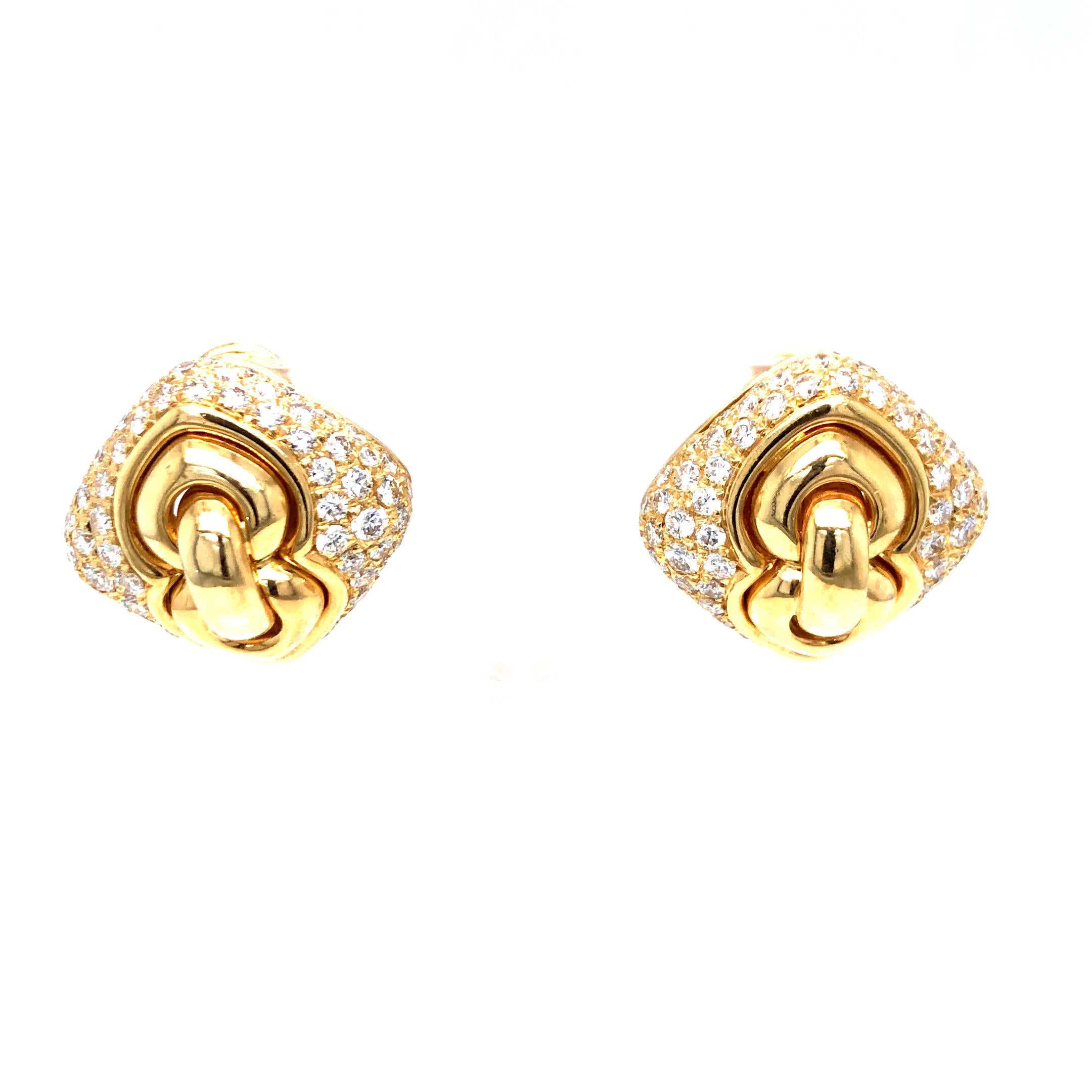 Estate Bulgari Square Pave Diamond Earrings in 18K Yellow Gold. The earrings feature 4ctw of pave set brilliant round cut diamonds. Omega backs.
0.75