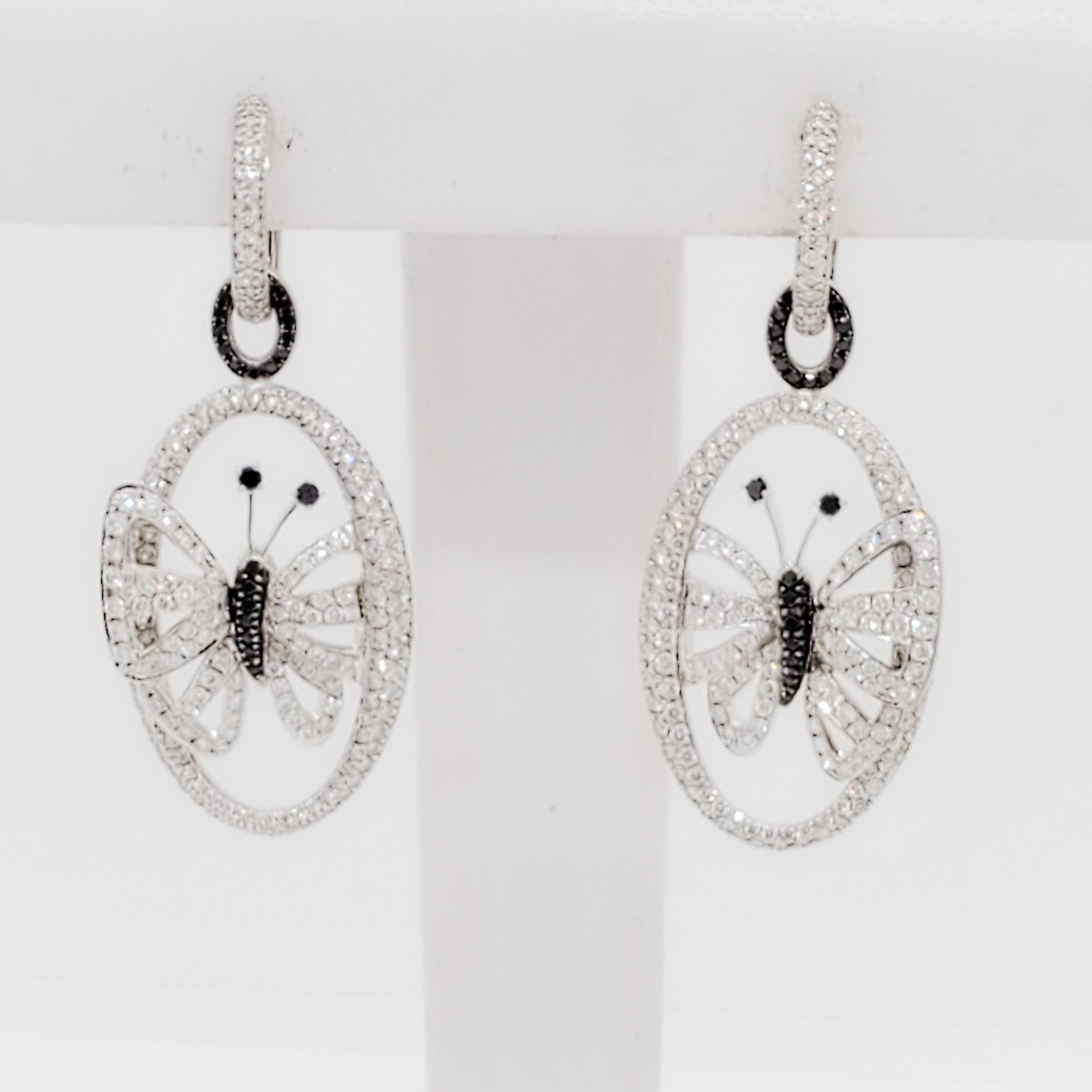 Round Cut Butterfly Dangle Earrings with Black and White Diamonds in 18k For Sale