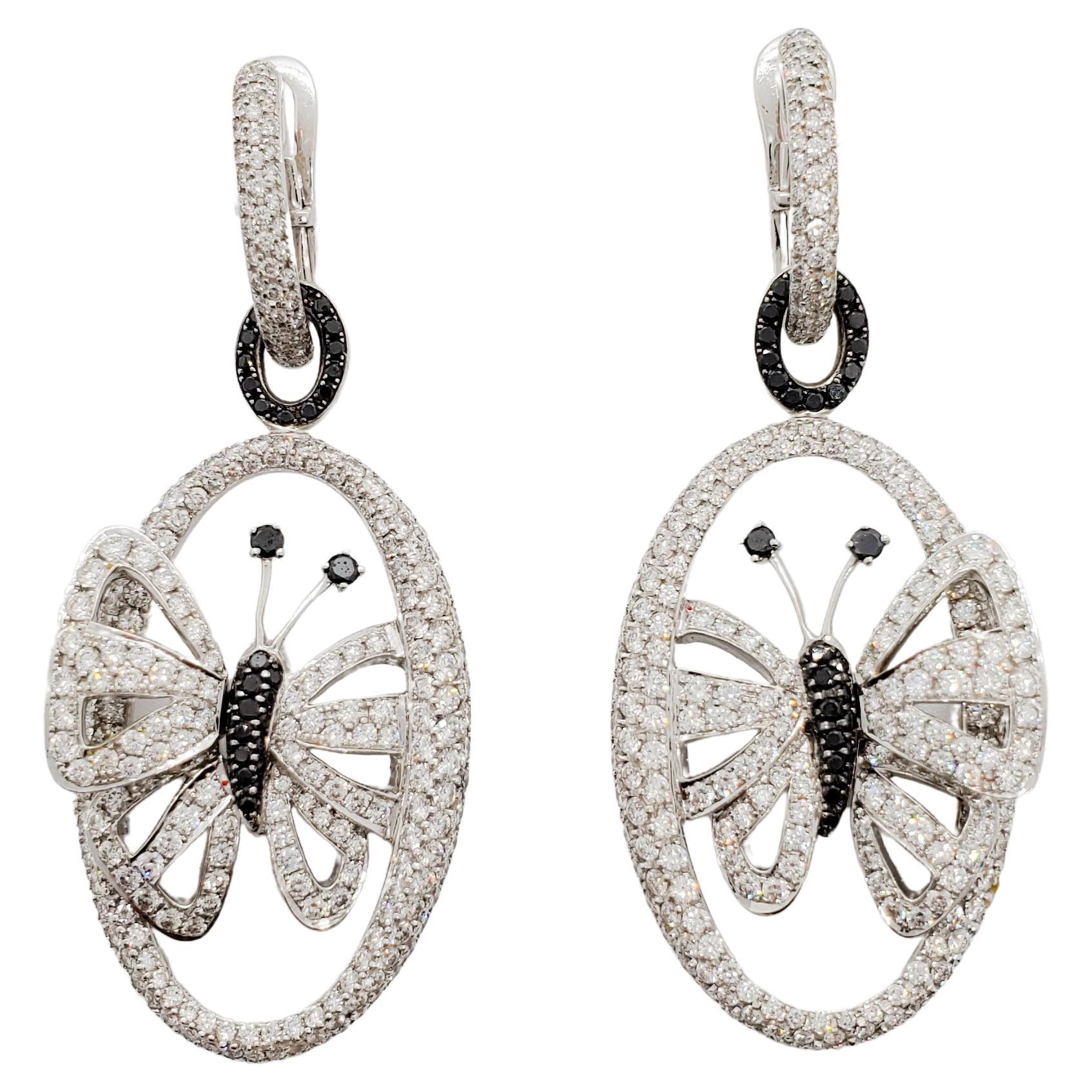 Butterfly Dangle Earrings with Black and White Diamonds in 18k For Sale