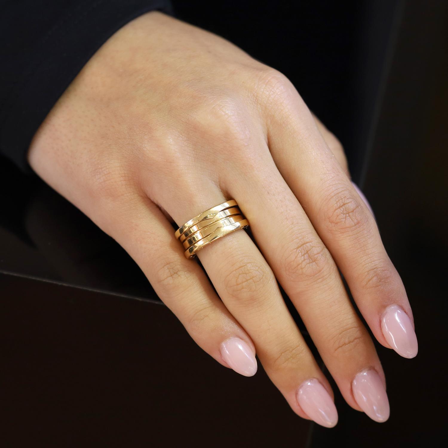 Showcasing a bold three-band design that blends worldy class with contemporary flair, the B.zero1 ring draws inspiration from the world’s most iconic amphitheater, the Colosseum. A testament to Bvlgari’s innovative spirit, this size 5 18k yellow