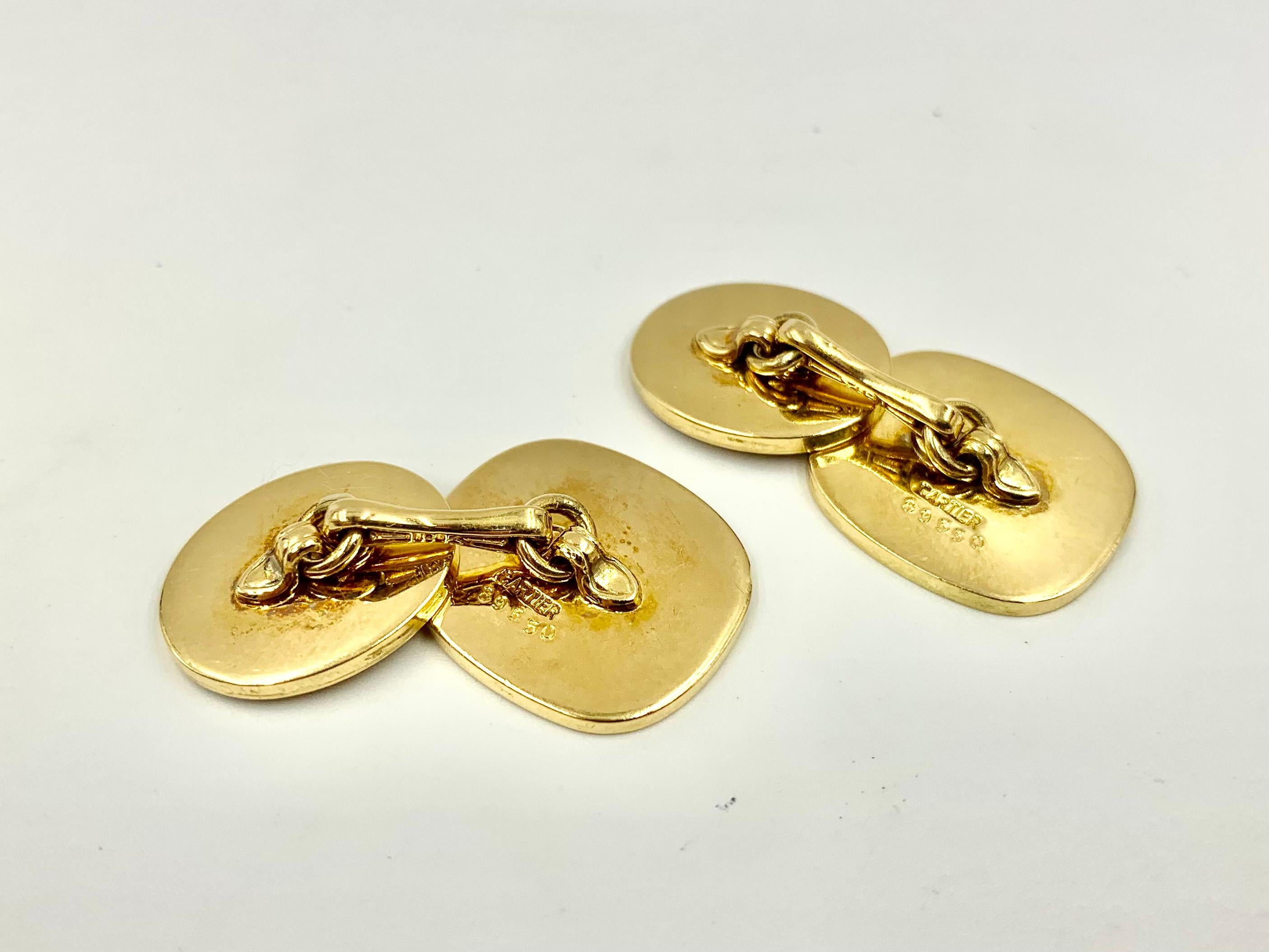 Estate Cartier 18K Gold Armorial Winged Bull Intaglio Crest Cufflinks In Good Condition For Sale In New York, NY