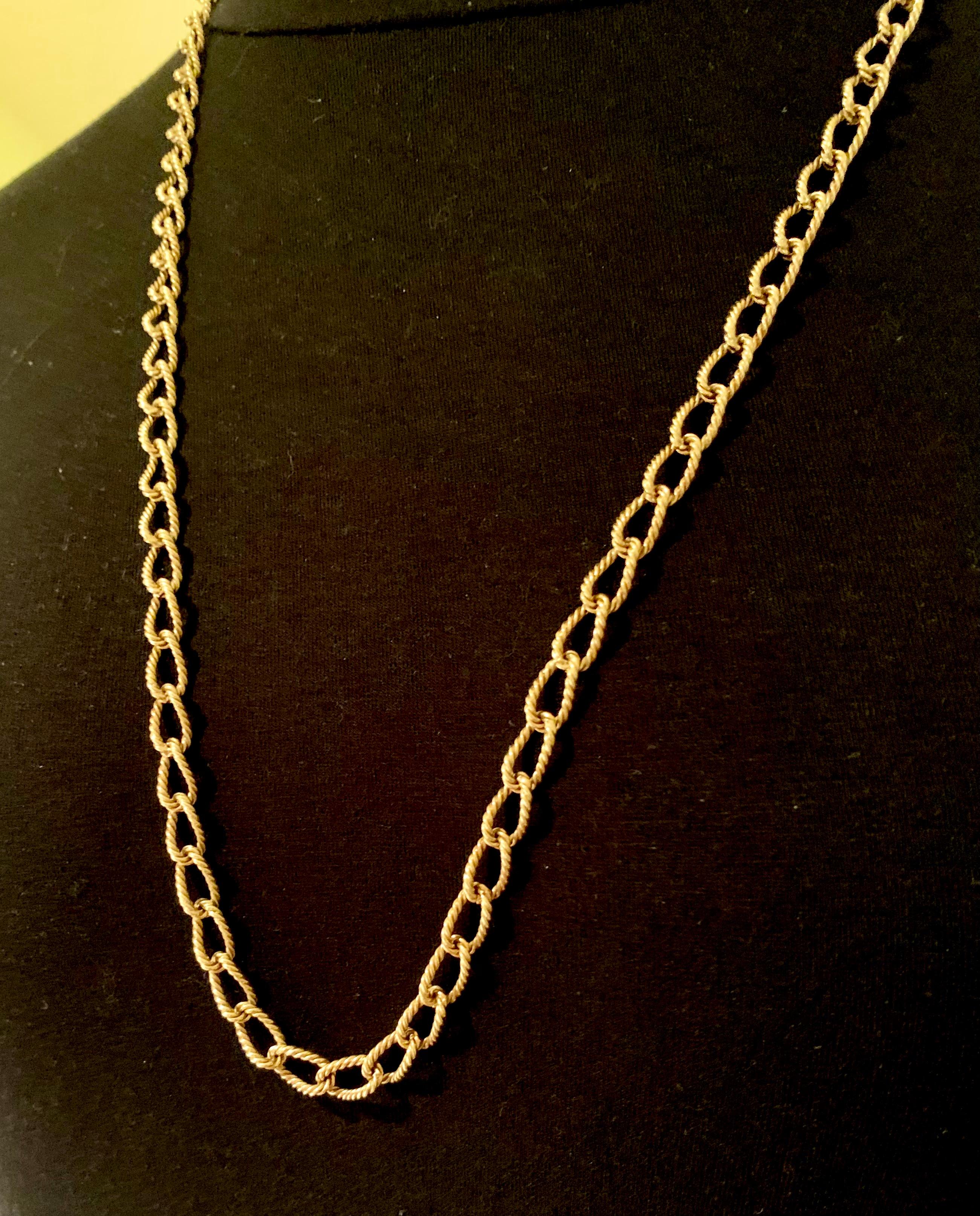 Fabulous estate Cartier 18K yellow gold rope twist link long chain necklace
1970's
This perfectly proportioned necklace epitomizes high style Cartier- the ideal length and the unusual rope twist design links will transform and elevate every outfit.