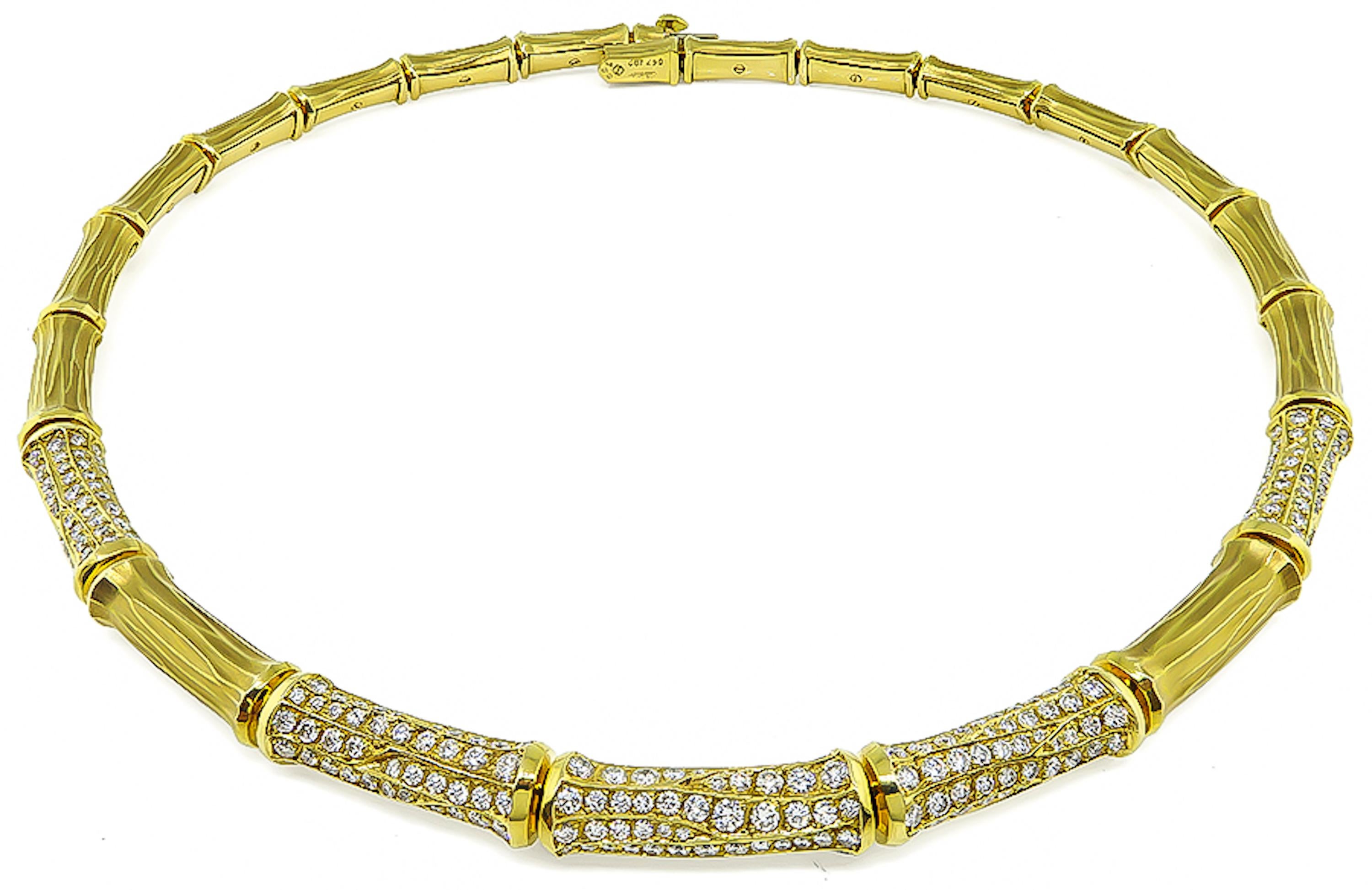 This is a fabulous estate Cartier 18K Yellow Gold Bamboo Necklace. The necklace is set with sparkling round cut diamonds that weigh approximately 5.00ct. The color of these diamonds is E-F with VS clarity. The necklace measures 17 inches in length