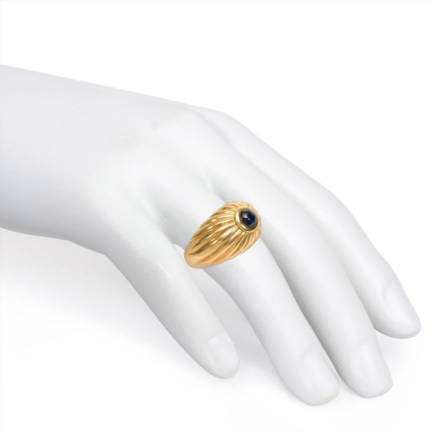 Women's or Men's Estate Cartier Ribbed Gold Bombé Ring with Cabochon Sapphire Center