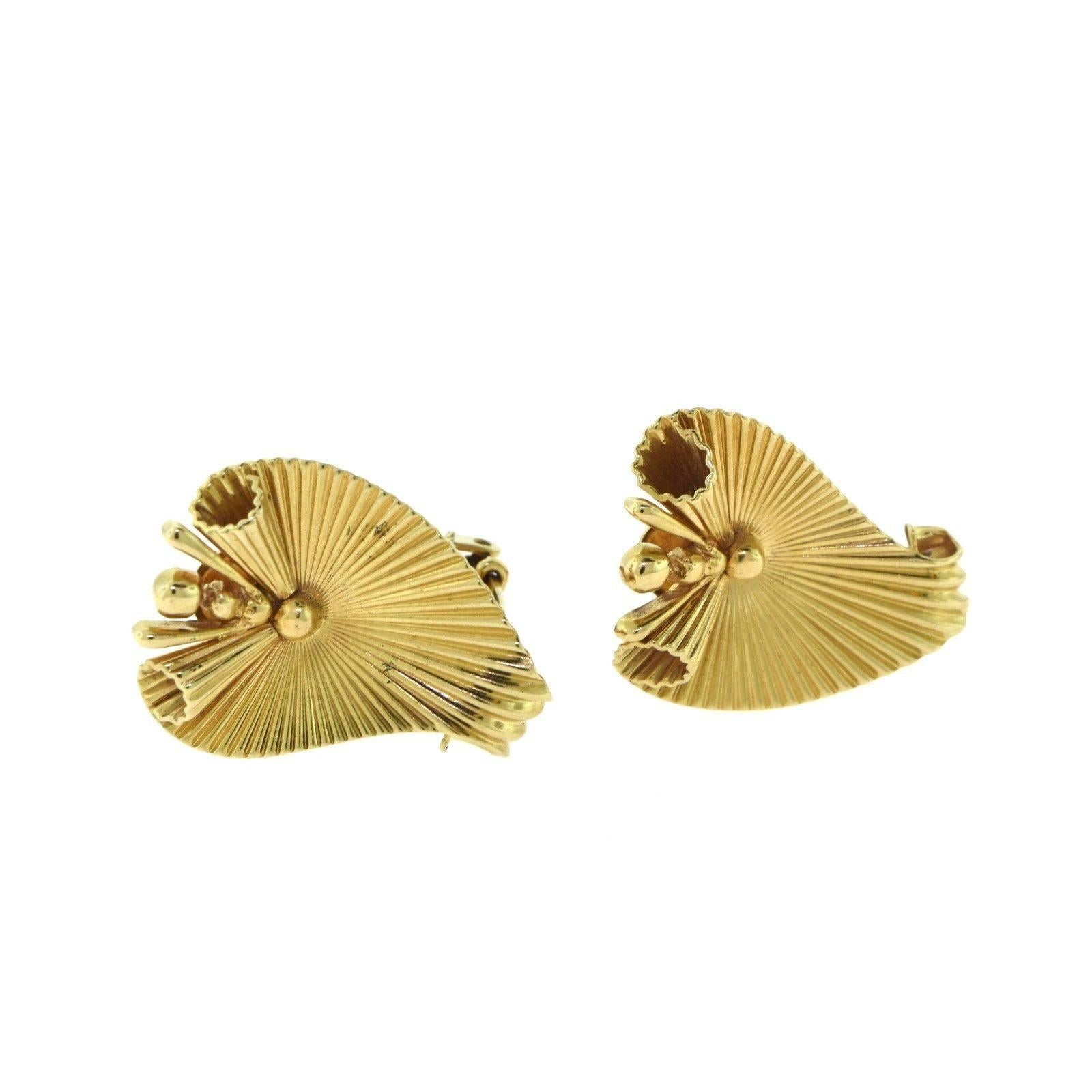 Designer: Cartier

Era: Estate

Style: Fluted 

Metal: Yellow Gold

Metal Purity: 14k 

Total Item Weight (g): 9.6

Earring Dimensions: 1.0 x 0.75 inches

Earring Thickness: 0.54 mm

Hallmark: 14k Serial No.  (Blocked for Privacy)

Signature: Cartier