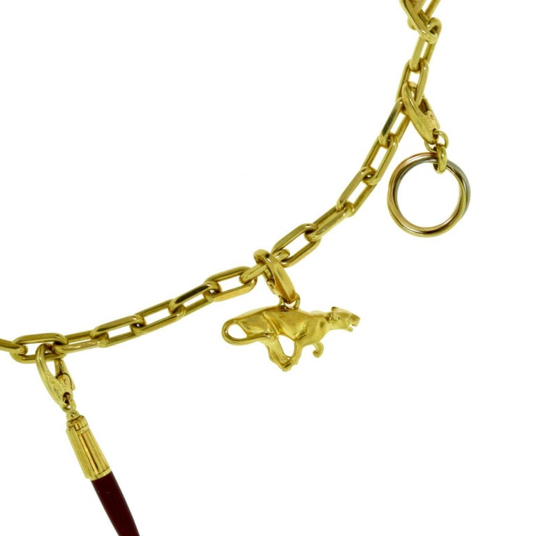 Estate Cartier Yellow Gold Santos Necklace with Set of Cartier Charms