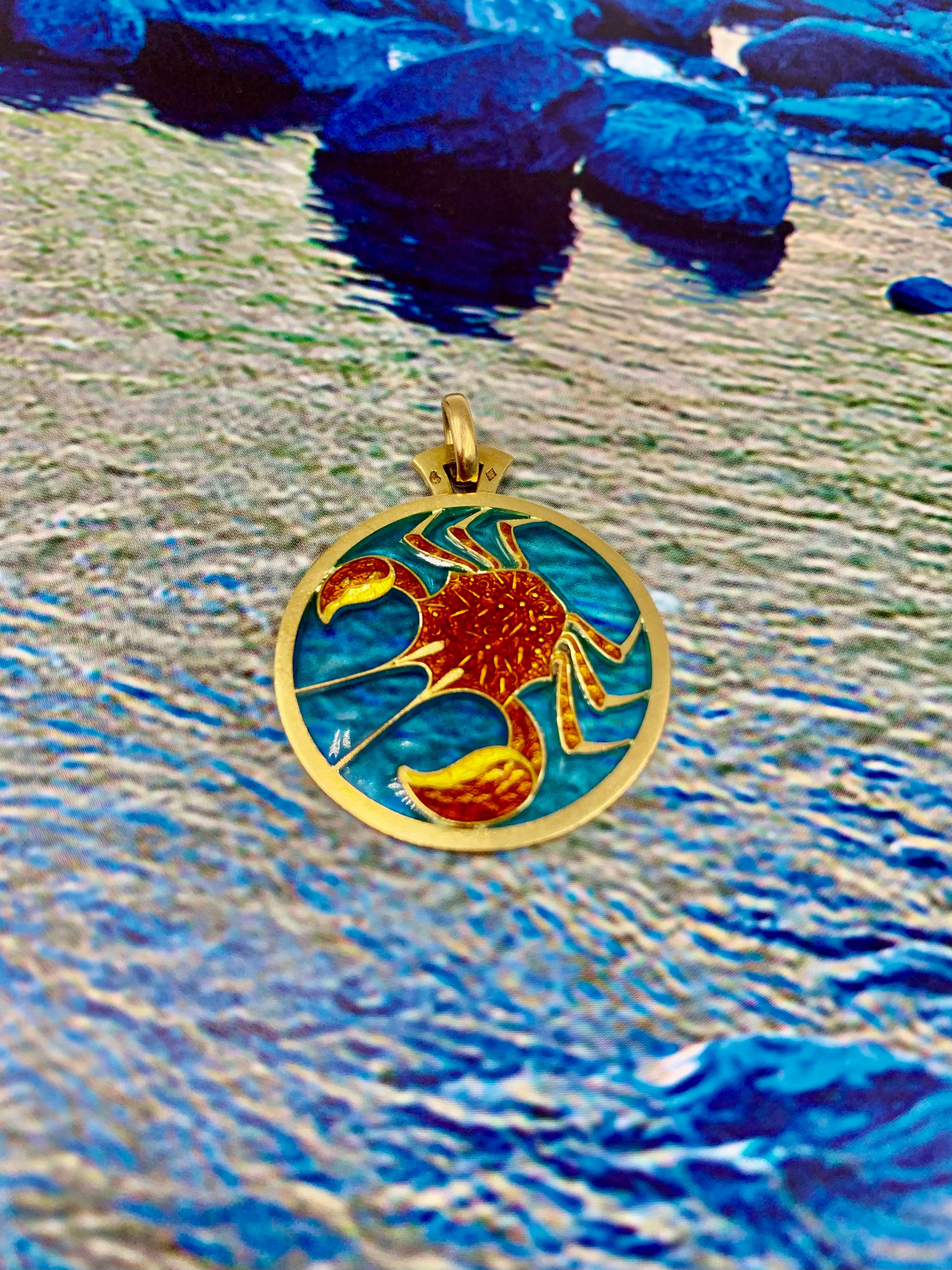 Exquisite Cartier polychrome and plique-a-jour enamel 18K yellow gold zodiac pendant for the sign of Cancer
20th Century, the 1970's
The circular pendant is among the finest Cartier zodiac pieces we've seen and is double sided, may be worn two ways.