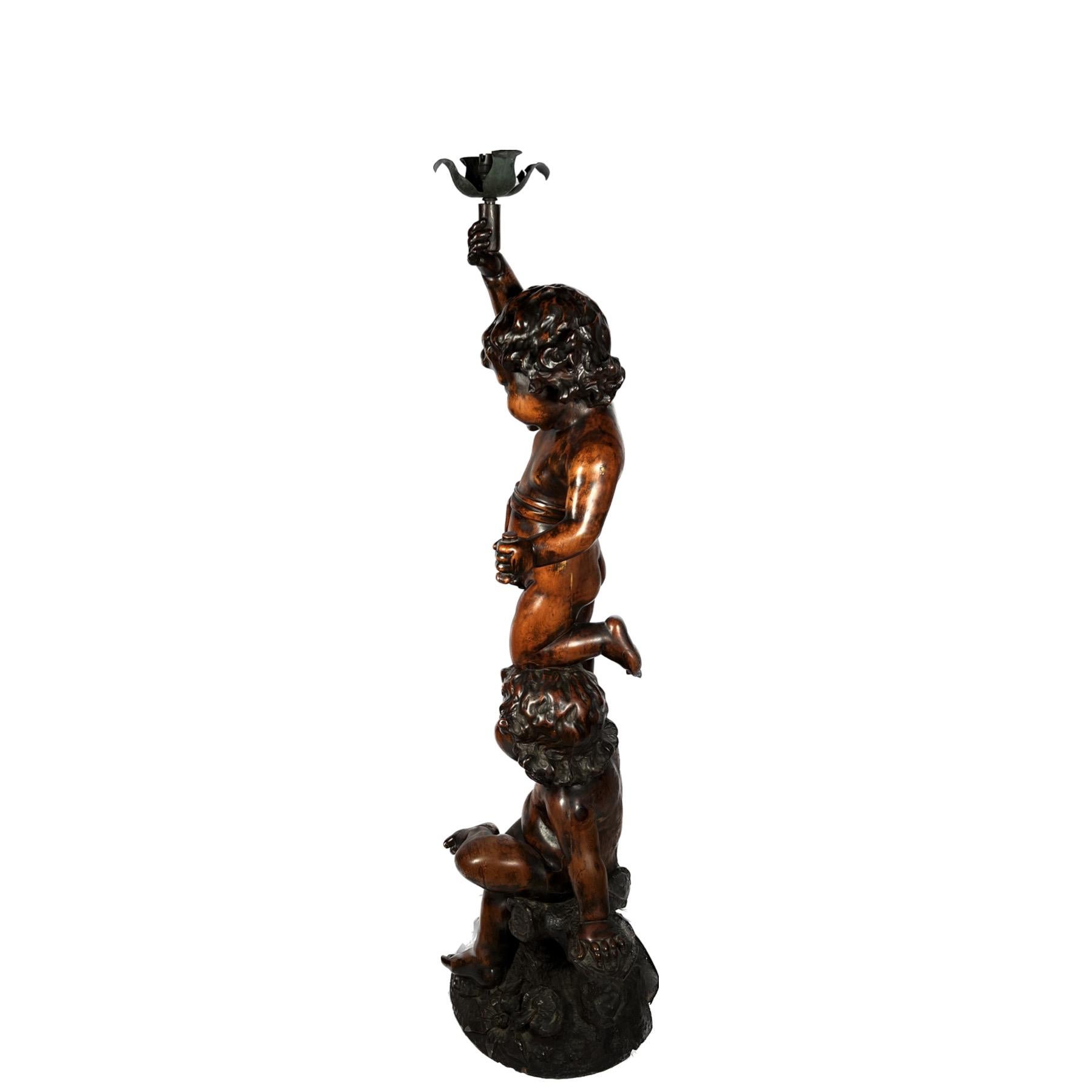 20th Century Estate Carved Wood Figurines Upholding a Torch, Circa 1950. For Sale