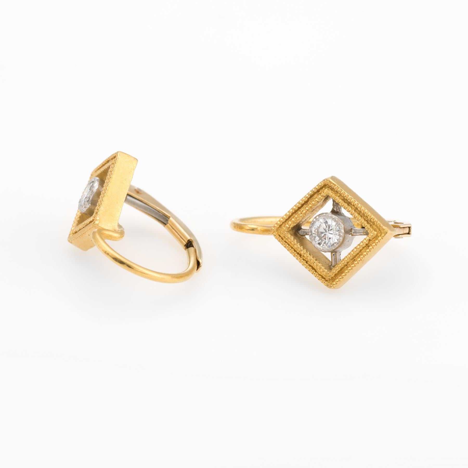 Finely detailed pair of pre owned Cathy Waterman diamond earrings, crafted in 22k yellow gold and 900 platinum. 

Two round brilliant cut diamonds are estimated at 0.07 carats each. The total diamond weight  is estimated at 0.14 carats (estimated at