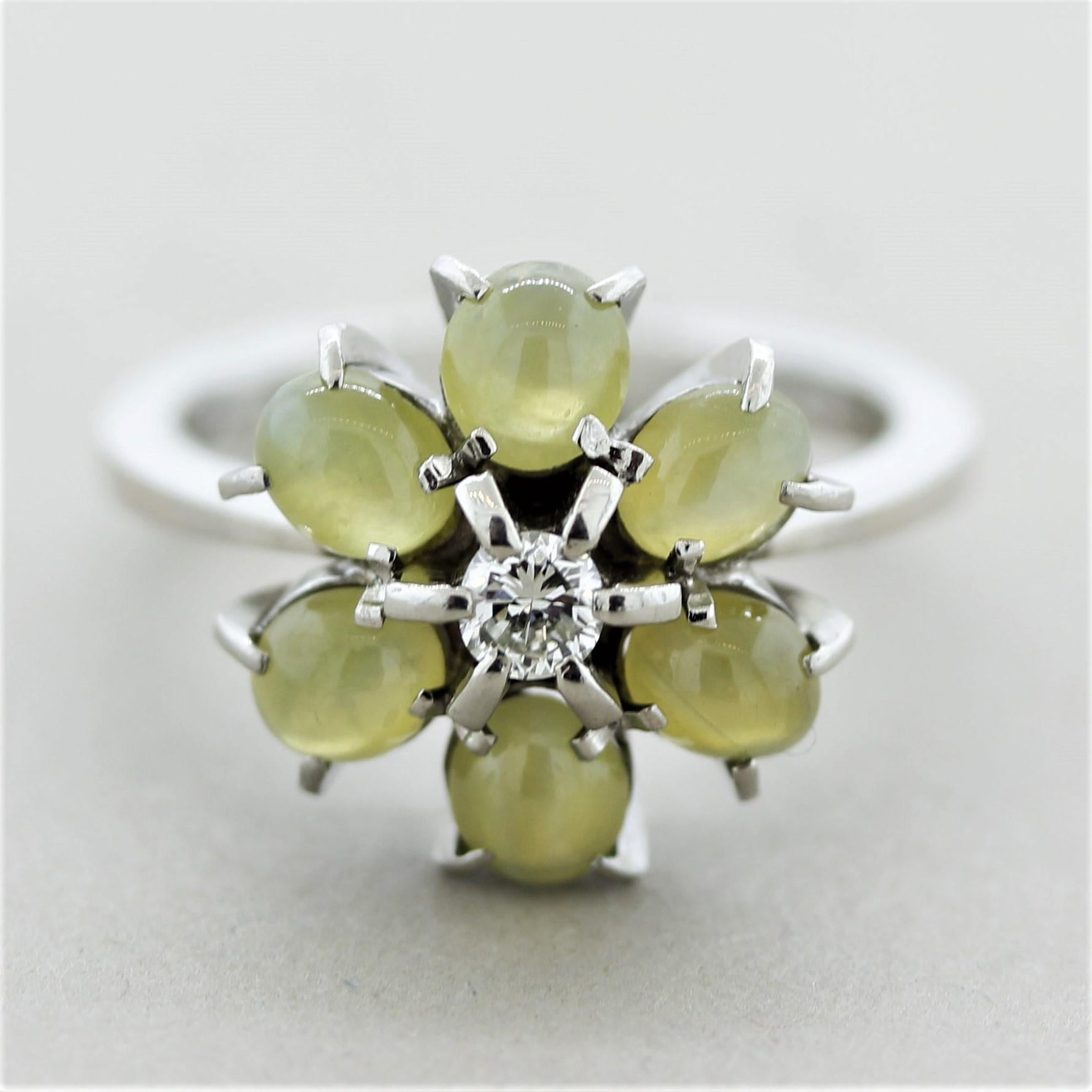 A super unique and stylish platinum ring. It features 6 cat’s eye chrysoberyl, each with a strong and defined cat’s eye and weighs a total of 3.08 carats. They are set around a single round brilliant-cut diamond (0.16ct) which makes a lovely flower