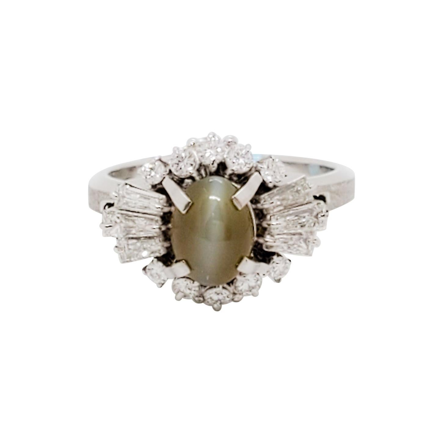 Cat's Eye Chrysoberyl Oval Cabochon and White Diamond Cocktail Ring For Sale
