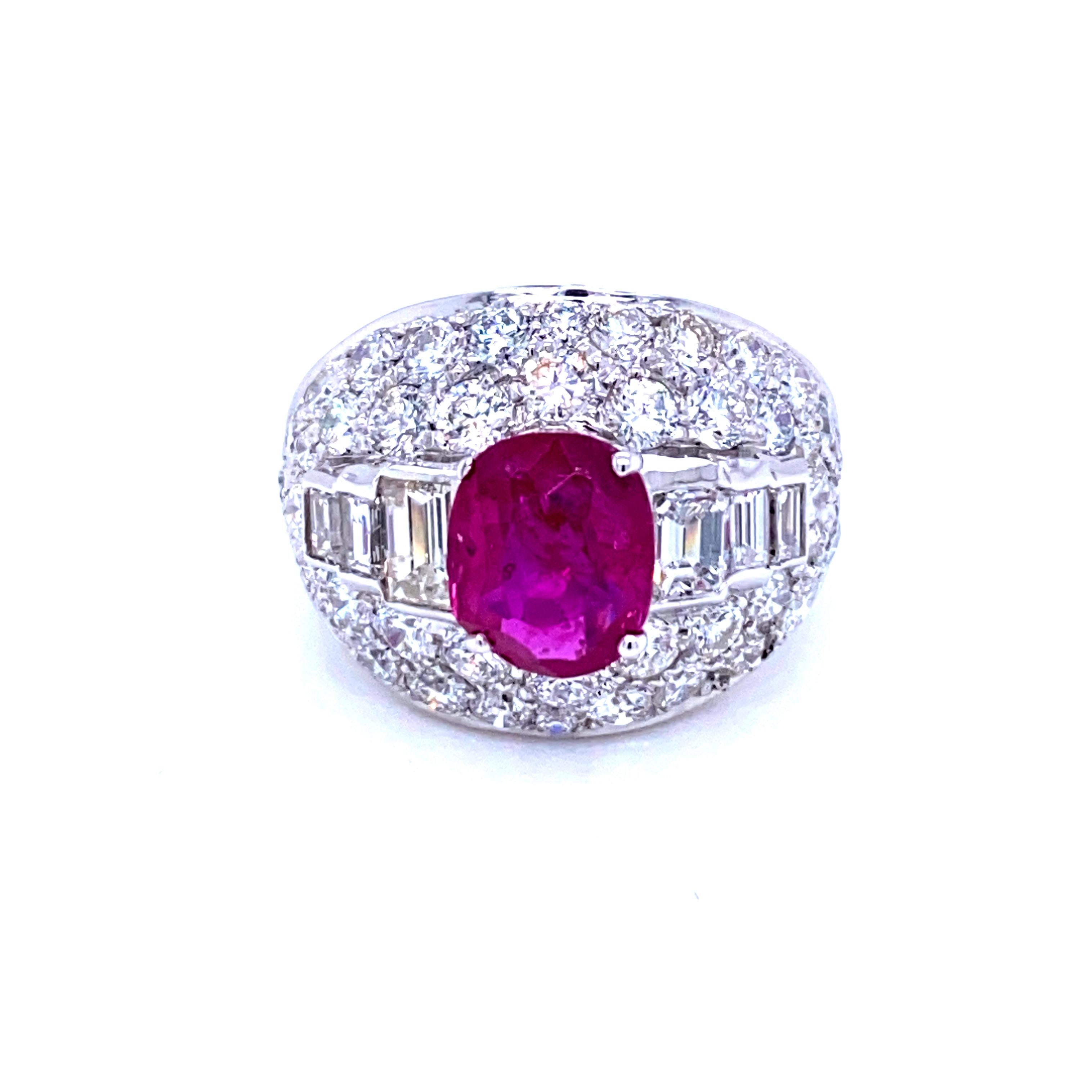 Sensational one of a kind Ruby and Diamonds cocktail ring, handcrafted in 18k white gold.

An important 18k white gold mount showcasing an exceptional oval-cut Natural untreated Ruby weighing 2.52 carats, surrounded by 3.80 carat of Diamonds, fine