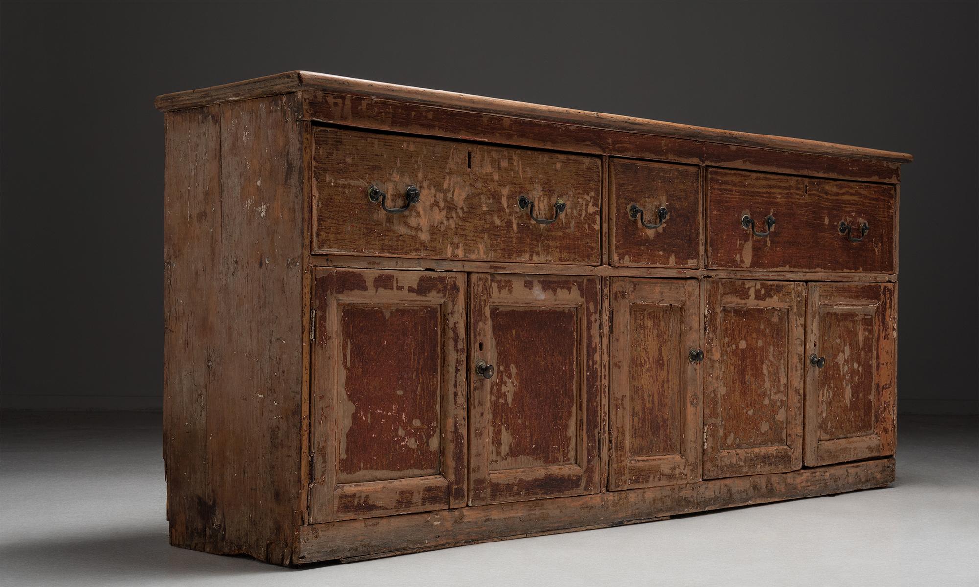 Estate chest of drawers

England Circa 1810

Weathered storage piece with drawers on top and cupboard storage on bottom. Original painted surface.

Measures: 77.5” W x 17.5” D x 34” H.