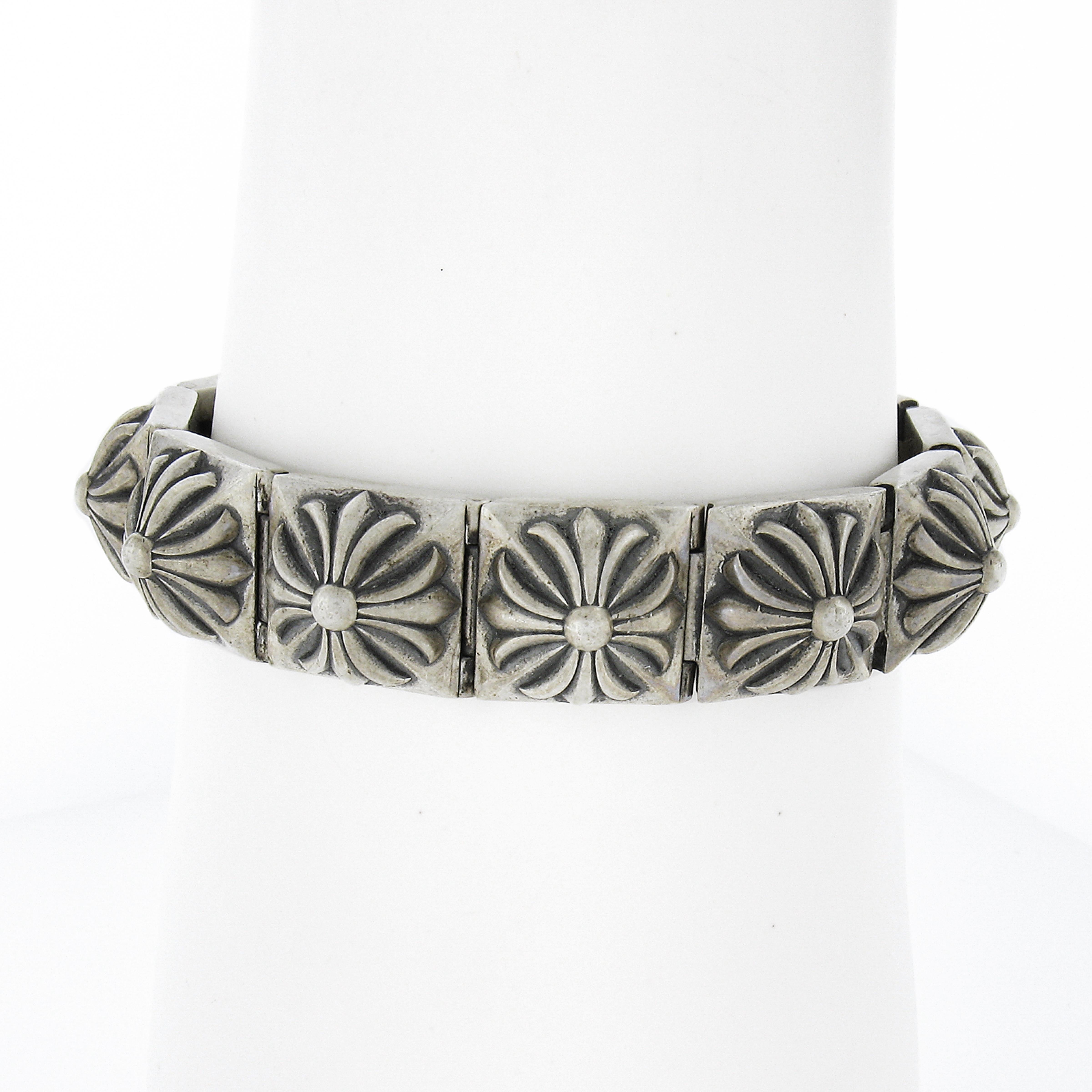 This truly bold and unique piece from Chrome Hearts features a floral square Pete Punk link design from 2012 and is signed properly at the back of every link. The bracelet is heavy, wide and is guaranteed to stand out with its wonderful design.