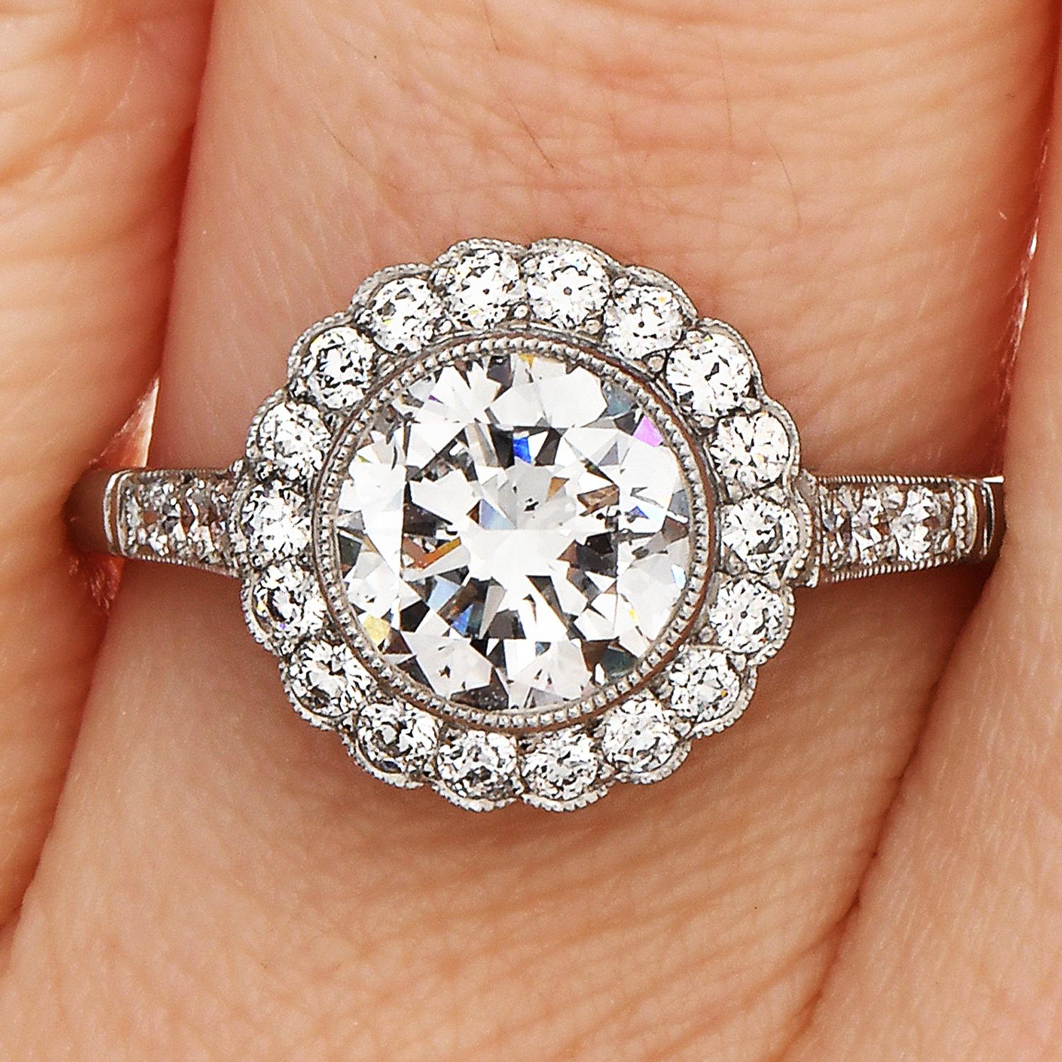 Estate Classic  1.26 Carats Diamond Platinum Flower Halo Engagement Ring In Excellent Condition In Miami, FL