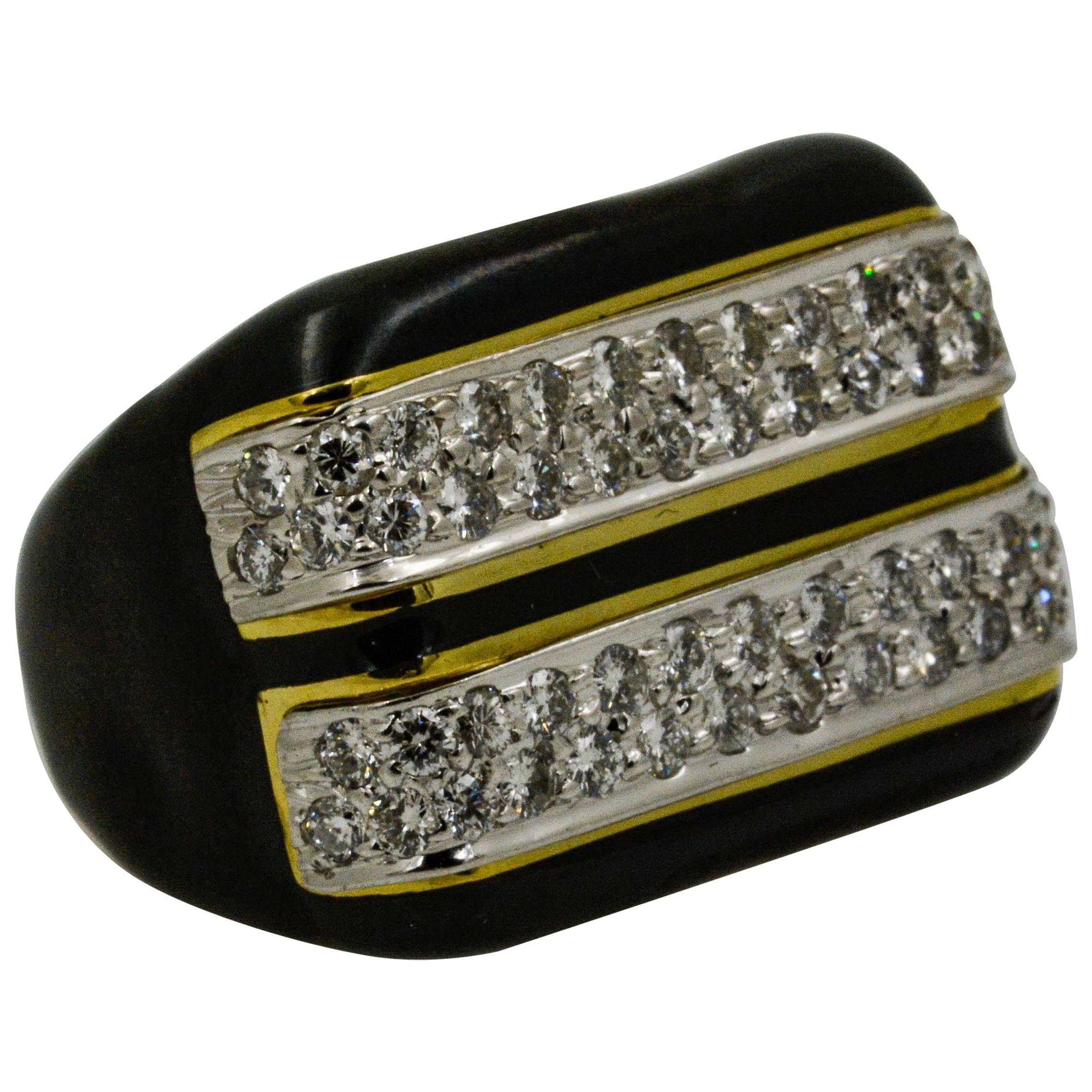An 18 karat yellow gold ring set with round brilliant cut diamonds and accented with black enamel.  The ring is pave set with two rows of 54 round brilliant cut diamonds which weigh approximately 1.00 carat combined with G-H coloring and VS clarity.