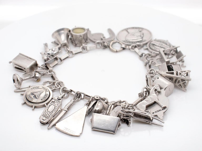 Estate Vintage Sterling Silver Charm Bracelet 12 Unique Charms 35 Grams -  Jewelry & Coin Mart, Schaumburg, IL