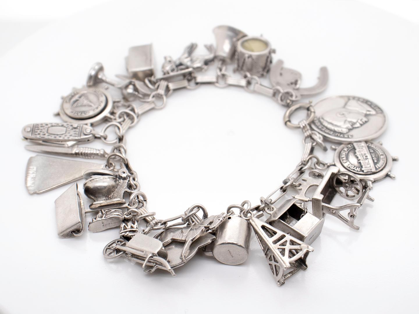 Modern Estate Complete Mid-Century Sterling Silver Charm Bracelet For Sale