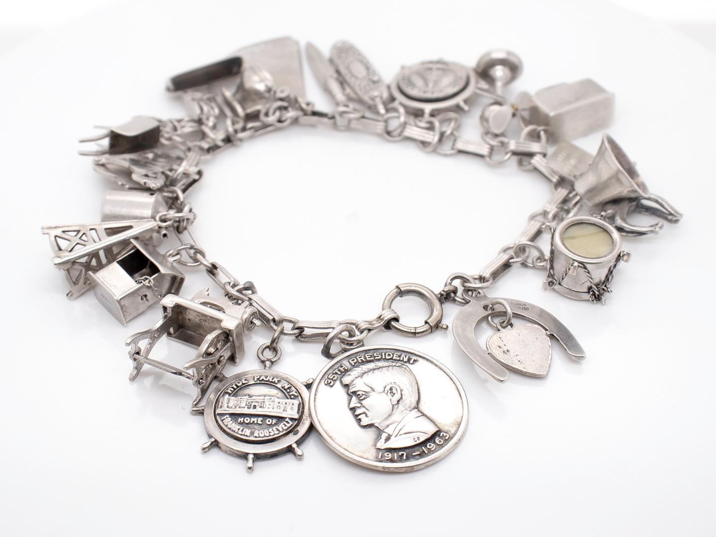 Estate Complete Mid-Century Sterling Silver Charm Bracelet In Good Condition For Sale In Philadelphia, PA