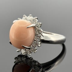 Estate Coral & Halo Diamond Platinum Ring