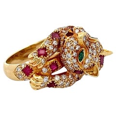 Craig Drake, bague panthère en or jaune 18 carats, diamants et rubis