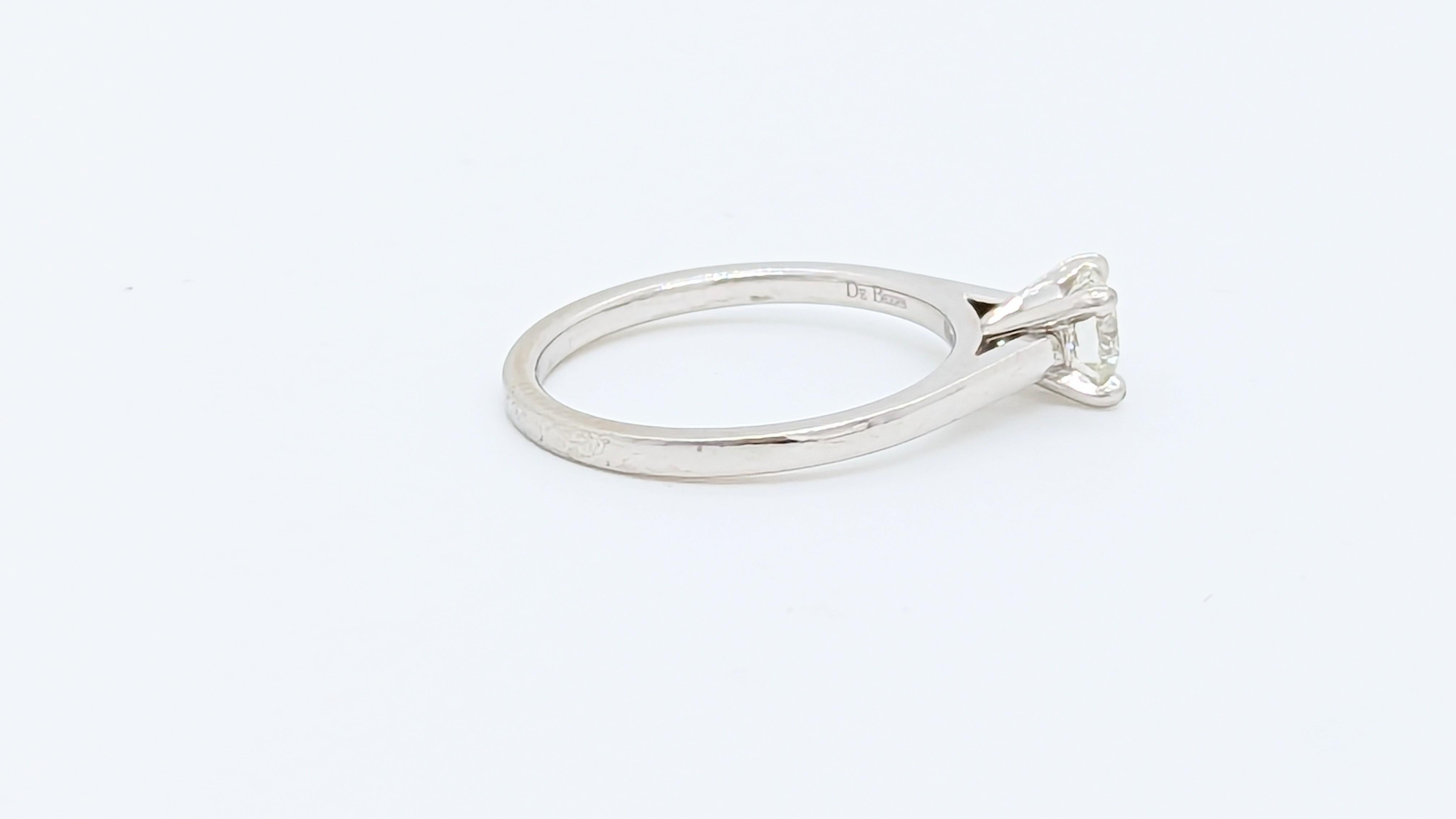 Women's or Men's Estate De Beers White Diamond Round Solitaire Ring in Platinum For Sale