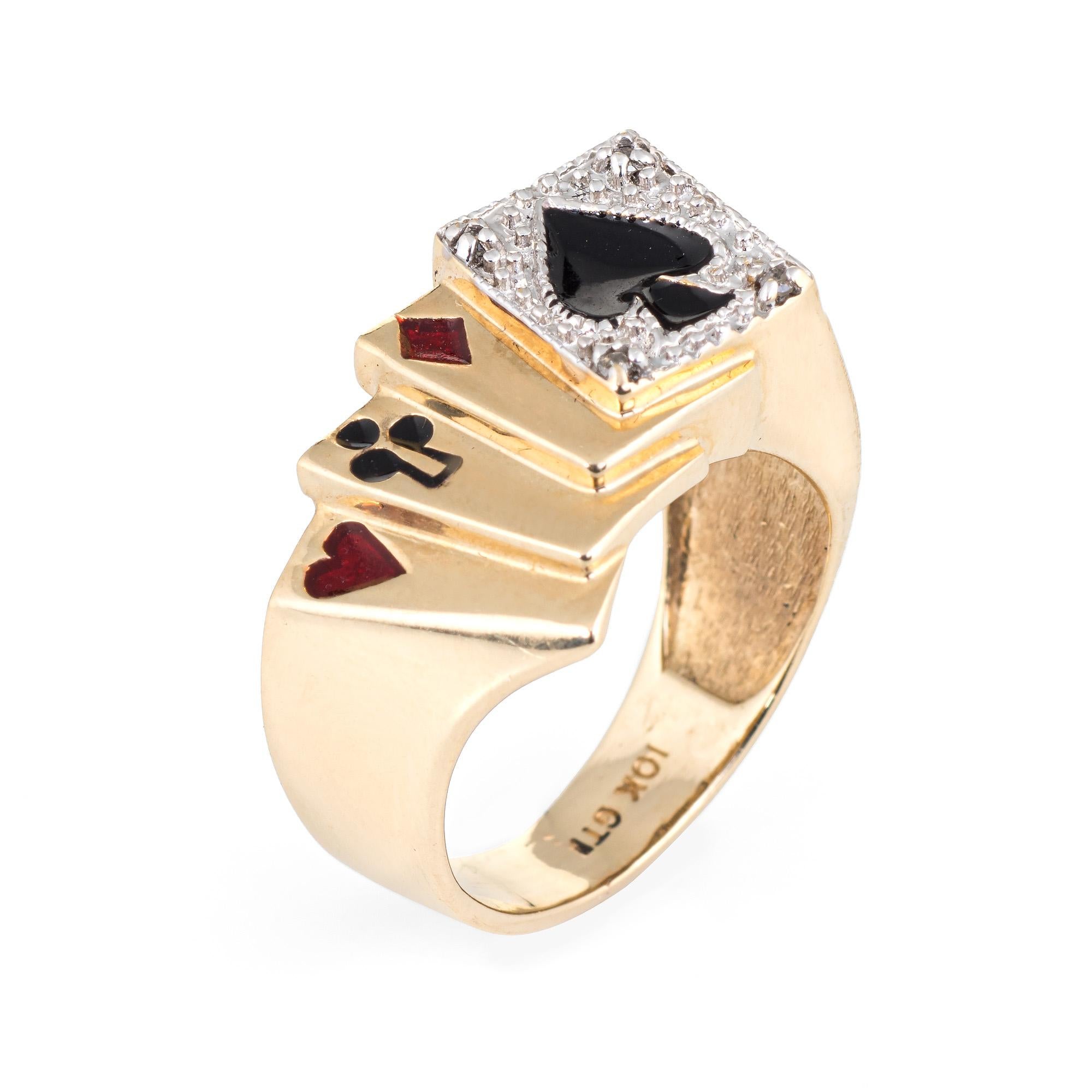 Vintage deck of cards ring crafted in 10 karat yellow gold. 

Four single cut diamonds total an estimated 0.02 carats (estimated at H-I color and I3 clarity).

A fun ring to commemorate a trip to your favorite gambling spot. Red and black enameled