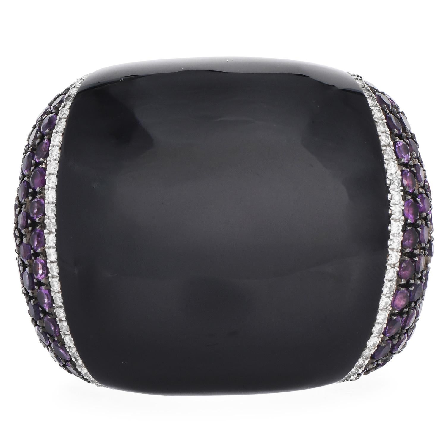 This  pristine high quality Designer Cluster Diamond , Amethyst and onyx cocktail ring is made in 18k white gold.

Prominently showcasing an onyx Center accompanied with 0.50 round cut diamonds, G-H color, and VS clarity and Round Amethyst, weighing