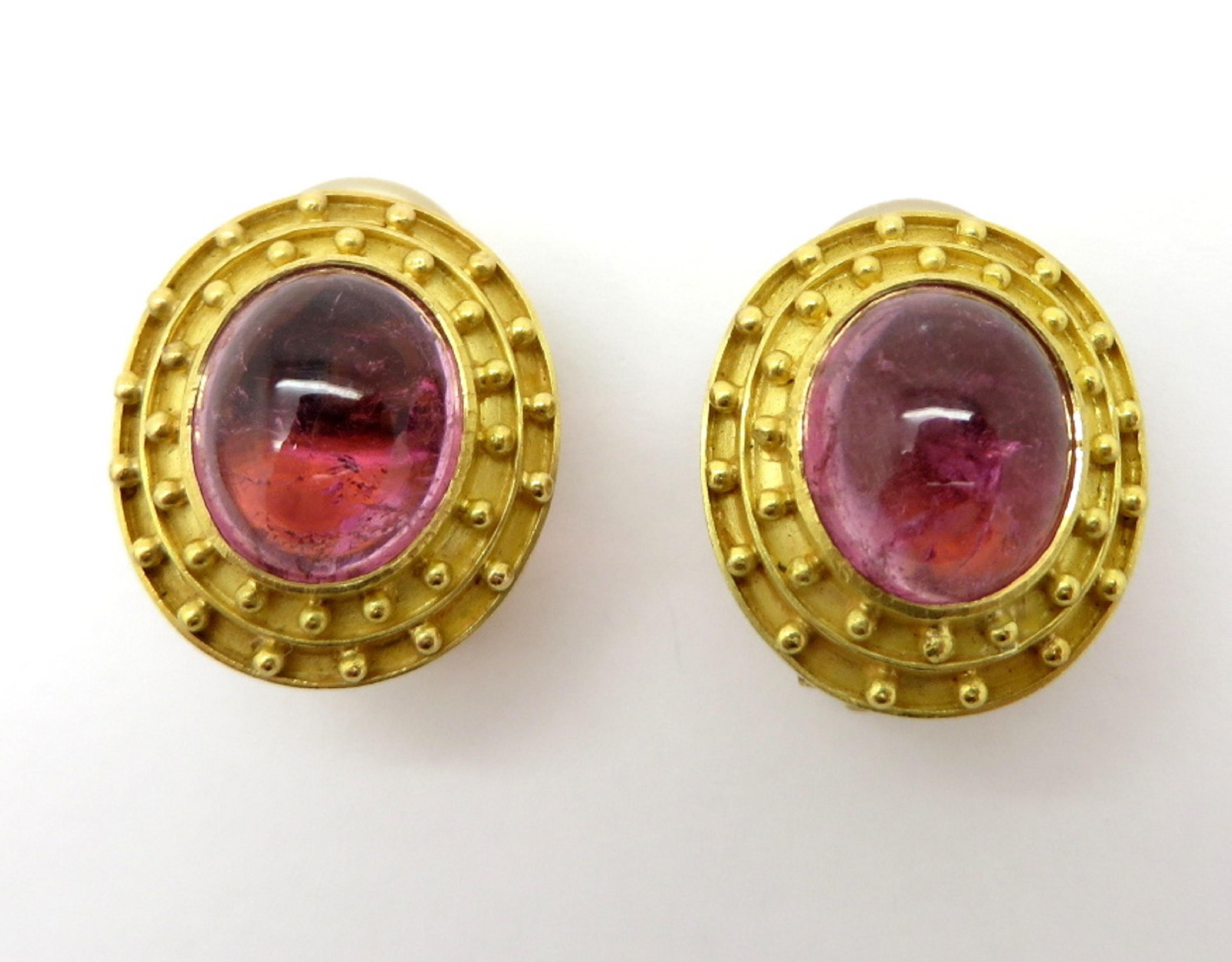 For sale is a designer pair of Elizabeth Locke Pink Tourmaline Oval Etruscan Earrings set in 18K Yellow Gold!
Two oval cabochon Pink Tourmalines are bezel set in a double beaded Etruscan halo design.
The earrings are convertible so you can wear them