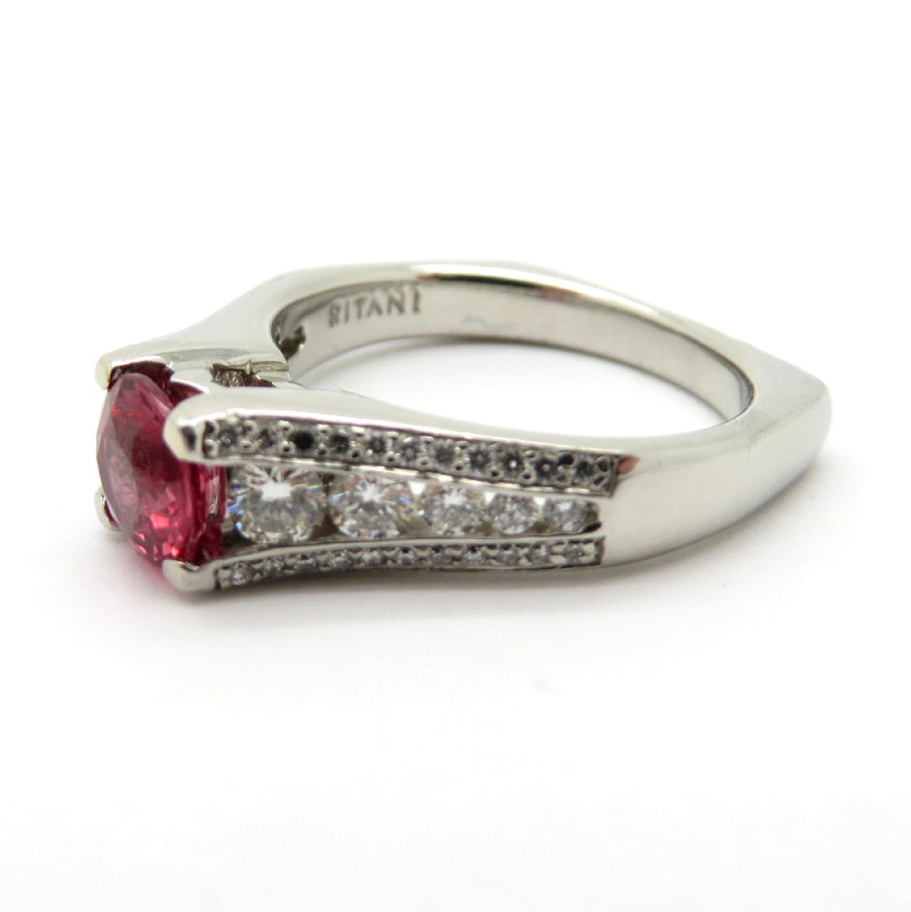 For sale is a Desiger Ritani Round Diamond and Round Spinel Platinum Ring!
Showcasing 1 Round Brilliant Cut Pinkish Orange Spinel, weighing 1.05 carats, measuring 6.09-6.13 x 3.71 mm.
Accenting the gemstone are 54 Round Brilliant Cut diamonds, bead