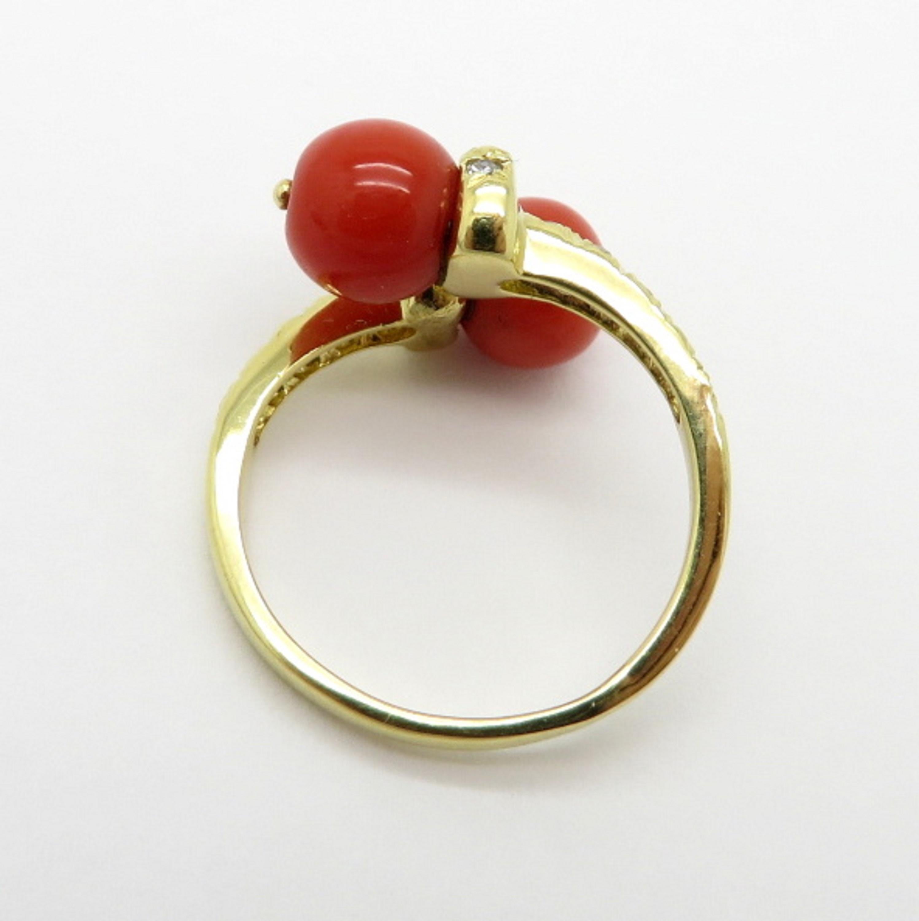 Estate Designer Tiffany & Co. 18 Karat Yellow Gold Coral and Diamond Bypass Ring In Excellent Condition In Scottsdale, AZ