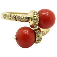 Estate Designer Tiffany & Co. 18 Karat Yellow Gold Coral and Diamond Bypass Ring