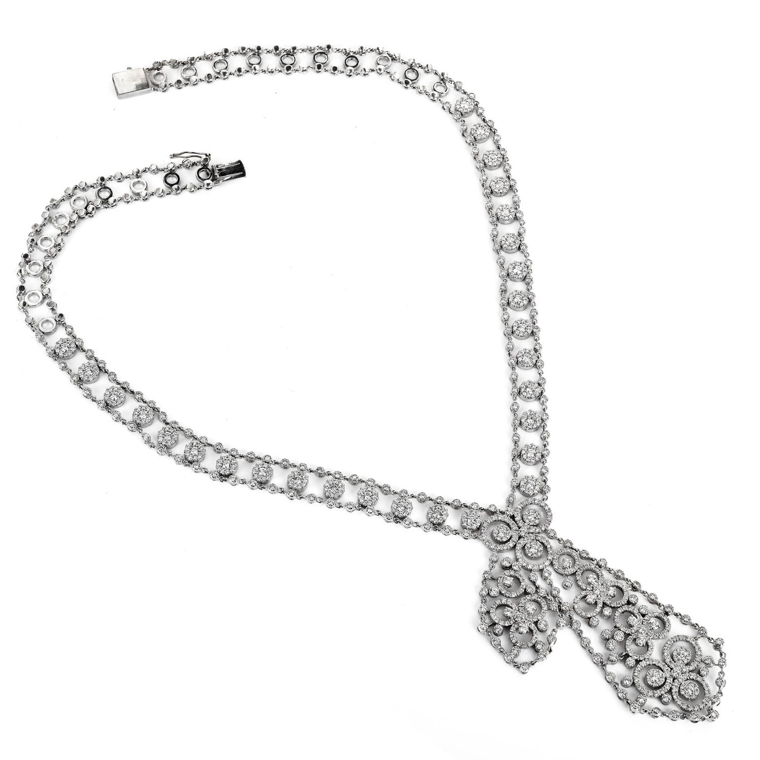 This piece is the perfect balance between a scarf's elegance and romance.

Finely crafted in 18K White Gold, this piece is enhanced by open flower motif smaller links and a large openwork design all over the links.

765 top quality, white Round cut